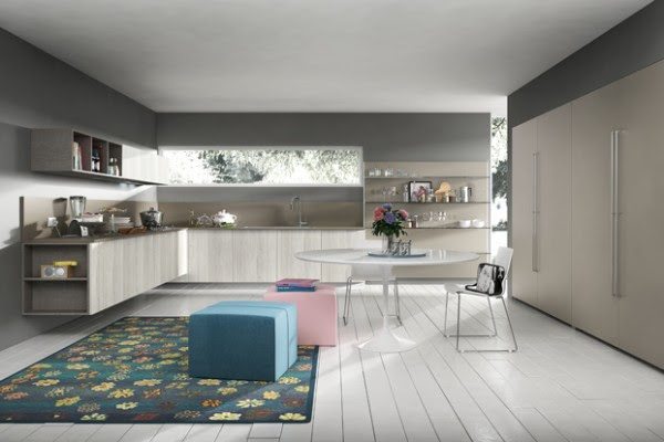 Sweet pink and blue color pops are the focal point in this culinary scene, placed upon a pretty rug that you might normally see in plusher parts of the home.