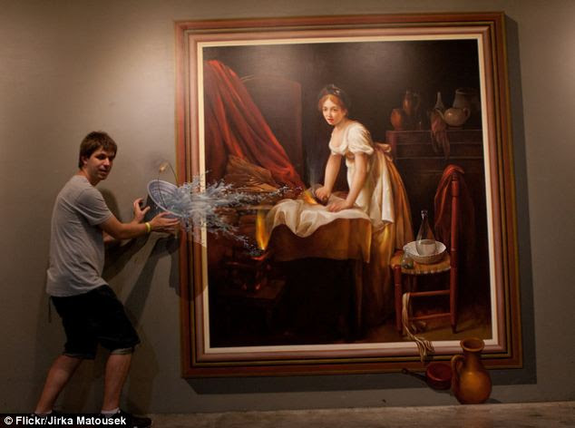 Visitors at the museum have to carefully position themselves on the two-dimensional paintings, such as this water bucket, in order to trick the viewer into thinking they are three dimensional