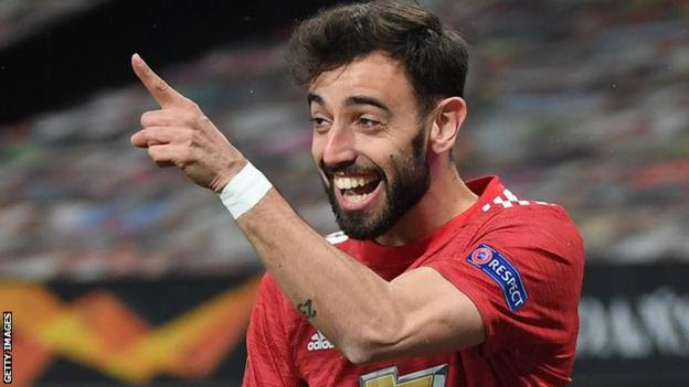 Manchester United's Bruno Fernandes celebrates scoring against Roma in the Europa League