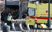 Four officers were wounded in a Brussels police raid on terrorists.