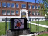 This Monday, May 4, 2020, file photo shows Willow Creek School in Willow Creek, Mont. The school with its 56 students will be among the first in the U.S. to reopen after being shut down due to the coronavirus concerns. Desks will be spaced 6 feet apart, temperatures will be checked upon arrival and any child not following social-distancing guidelines will be sent home, officials said. (AP Photo/Matt Volz)