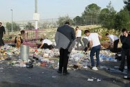 Volunteers Search for Ring in Trash Heap