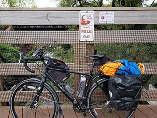A bike leans against a rail at mile zero of the Iron Belle Trail in Gogebic County.