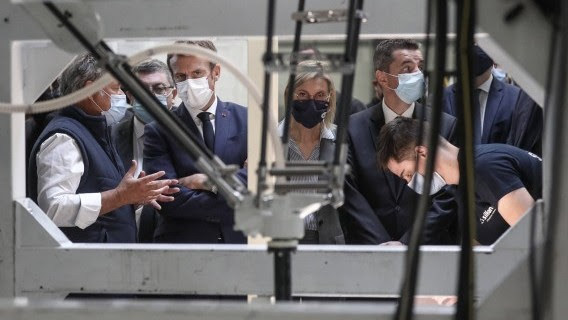 The French president visiting a factory in Saint-Etienne last year Source: