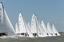 J/70s sailing start off Cowes, England