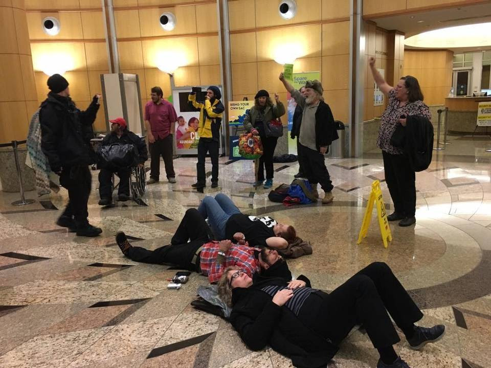 Homeless rights activists occupy Sacramento City Hall after the City Council abruptly ended its meeting Tuesday night. The activists remained in the building for more than an hour.