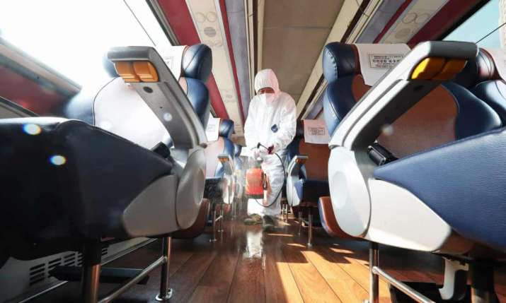 A bus in South Korea is disinfected. From theguardian.com