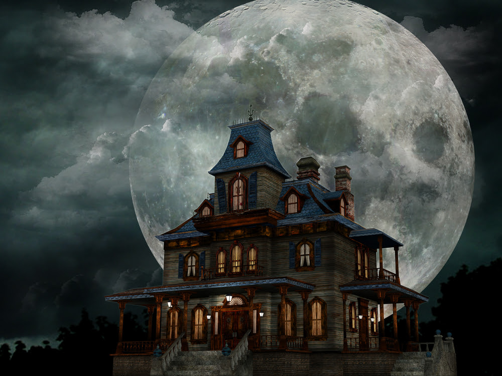 house at night with a full moon
