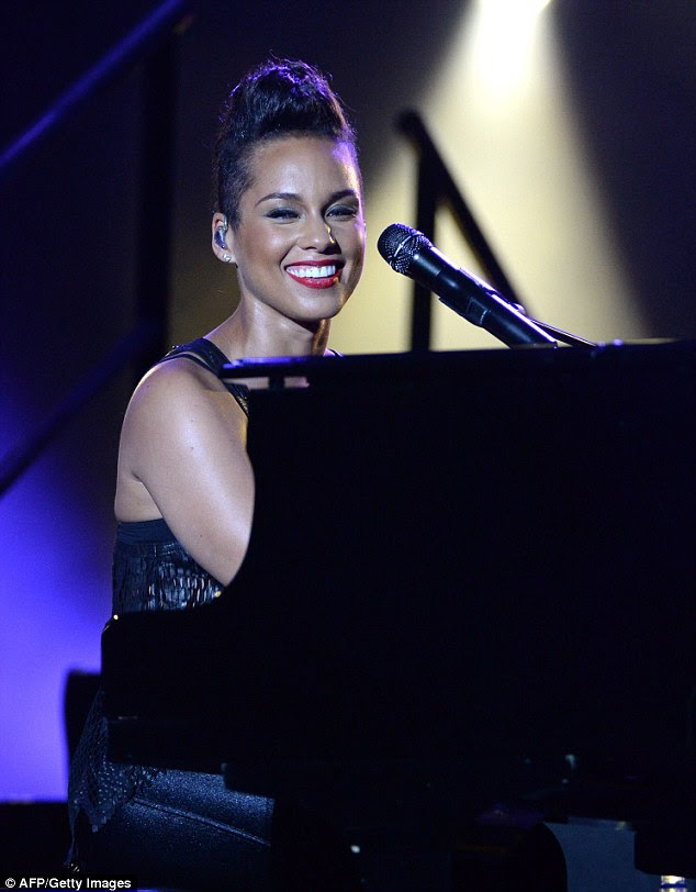 Tickling the ivories: The 33-year-old singer was the highlight of the nine-day festival's closing evening