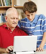 Father and Son at Computer