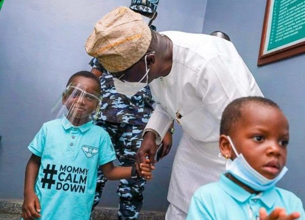 Lagos State governor, Sanwo-Olu meets the boy in the "mummy calm down" video (photos)