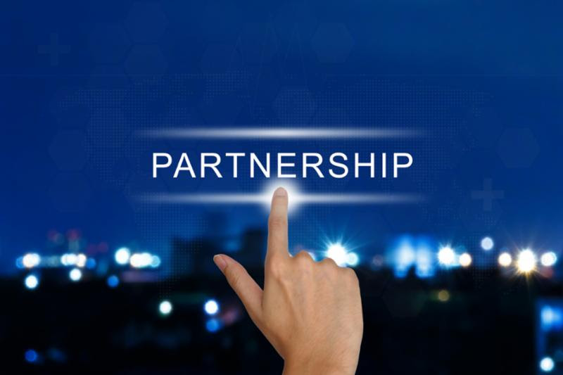 partnership_button_hand.jpg