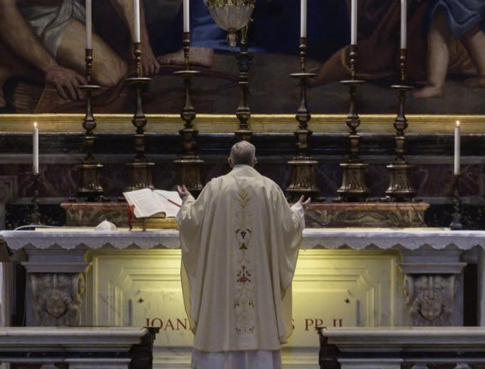 Pope Francis celebrates Mass at the tomb of St. John Paul II in St. Peters Basilica May 18, 2020.