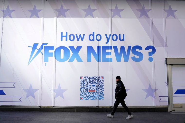 A person walks past the Fox News headquarters in New York City
