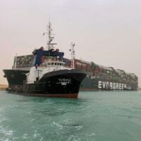 [Pics] Gigantic ship blocks critical Suez Canal