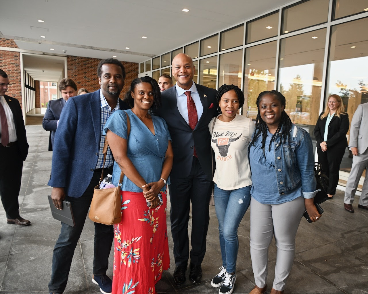 Governor Wes Moore taking photo with Salisbury University students