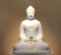 A statue of a personDescription automatically generated