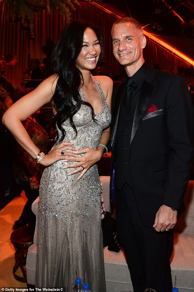 Tim Leissner, pictured with hi wife Kimora Lee Simmons, is facing up to 10 years in prison in the US and in Malaysia and has agreed to pay $43million in fines already for his role in the theft