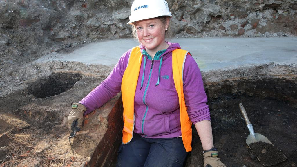Archaeologist Natalie Paynter at an archaeological dig at the site of the old Carlton Hotel carpark. The hand made brick wall next to her is circa 1855 to 1865, forming part of the early original site of the Geelong Advertiser. Picture: Peter Ristevski