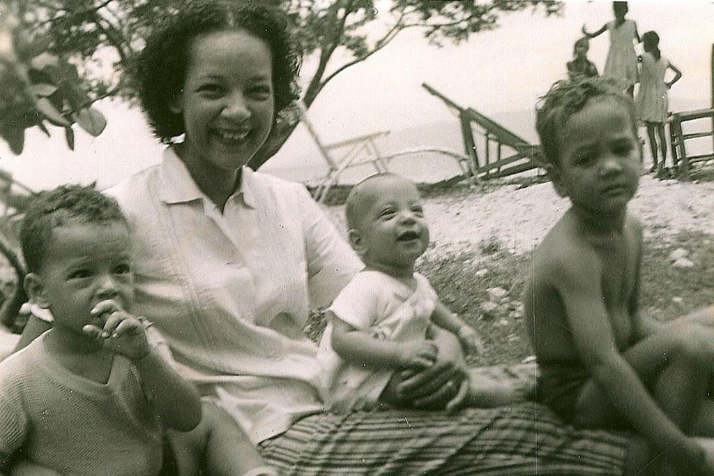 A photo of Lyliane Gaetjens with her three sons; after Joe's disappearance, she relocated her family to Puerto Rico in a bid to keep them safe.