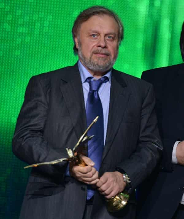Producer Leonid Lebedev with an award for Geographer Drunk Away His Globe at the 27th Nika awards ceremony in 2014
