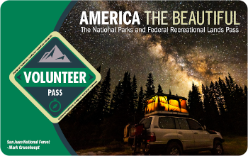 2022-Volunteer Pass_front-350x220-web Image of the 2022 Interagency Volunteer Pass with a 4-wheel drive vehicle with a tent on top under a starry night sky.