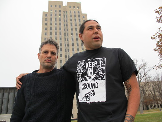 Actor-activist Mark Ruffalo poses with Dallas Goldtooth, of the Indigenous Environmental Network, outside the state Capitol in Bismarck, N.D., Tuesday, Oct. 25, 2016.