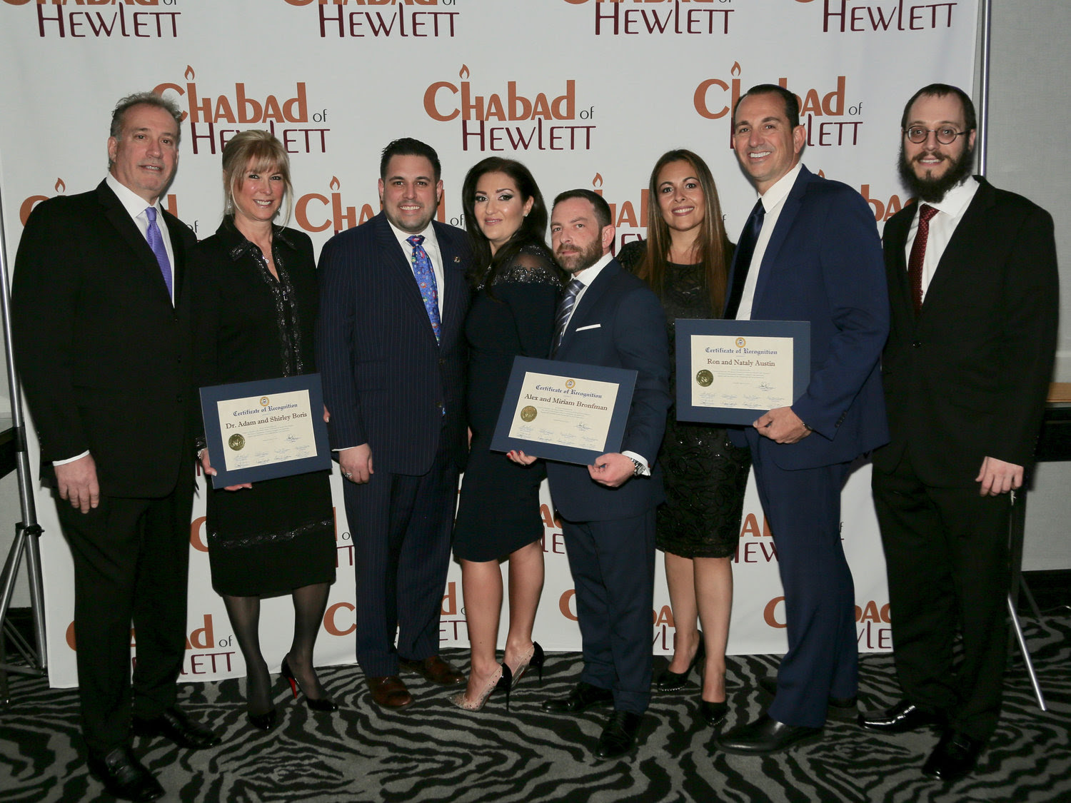 Town of Hempstead Councilman Anthony D’Esposito presented certificates of recognition to the Chabad of Hewlett honorees. From left were Dr. Adam and Shirley Boris, D’Esposito, Miriam and Alex Bronfman and Nataly and Ron Austin, and Rabbi Nochem Tenenboim.