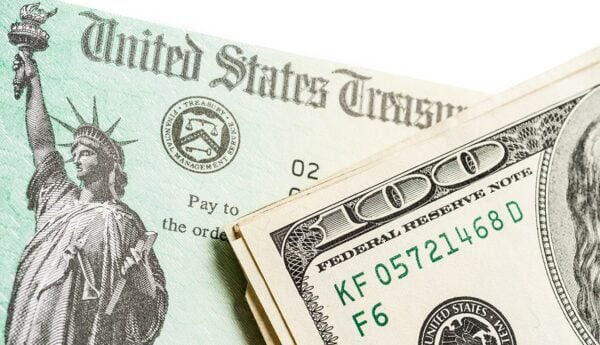 United States Treasury check and money