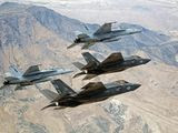 F-35C Lightning IIs, attached to the Grim Reapers of Strike Fighter Squadron (VFA) 101, and F/A-18E/F Super Hornets attached to the Naval Aviation Warfighter Development Center (NAWDC) fly over Naval Air Station Fallon&#39;s (NASF) Range Training Complex near Fallon, Nevada, Sept. 3, 2015. (Lt. Cmdr. Darin Russell/U.S. Navy via AP) ** FILE ** 