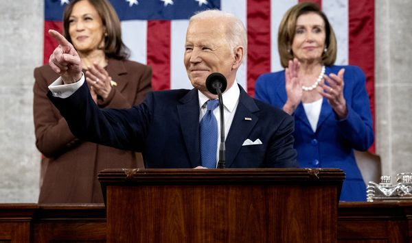 President Joe Biden delivers his State of the Union address to a joint session of Congress at the Capitol, Tuesday, March 1, 2022, in Washington, as Vice President Kamala Harris and Speaker of the House Nancy Pelosi look on. (Saul Loeb, Pool via AP)