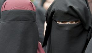Switzerland bans face coverings amid charges of ‘sexism’ and ‘Islamophobia’