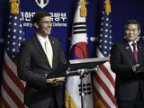 U.S. Defense Secretary Mark Esper, left, and South Korean Defense Minister Jeong Kyeong-doo, right, hold a joint press conference after the 51st Security Consultative Meeting (SCM) at the Defense Ministry in Seoul Friday, Nov. 15, 2019. U.S. Defense Secretary Esper says South Korea is wealthy enough to pay a bigger share of the cost of having U.S. troops on its soil. (Jung Yeon-je/Pool Photo via AP) **FILE**