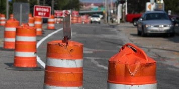 orange construction barrels