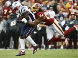 FILE - In this Oct. 6, 2019, file photo, Washington Redskins cornerback Josh Norman (24) tackles New England Patriots running back Sony Michel (26) during the second half of an NFL football game in Landover, Md. The Redskins have released Norman and wide receiver Paul Richardson. Norman struggled to live up to the $75 million, five-year contract he signed in 2016 after an All-Pro season in Carolina. He was let go with one year left on that deal. Norman&#39;s release and $12.5 million salary-cap savings could pave the way for Washington to give cornerback Quinton Dunbar a raise. Richardson&#39;s release doesn&#39;t save as much. (AP Photo/Patrick Semansky, File)