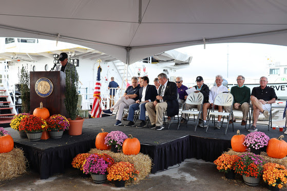 Image of Commissioner Bob Woodard speaking during the christening event in Wanchese Marine Industrial Park.