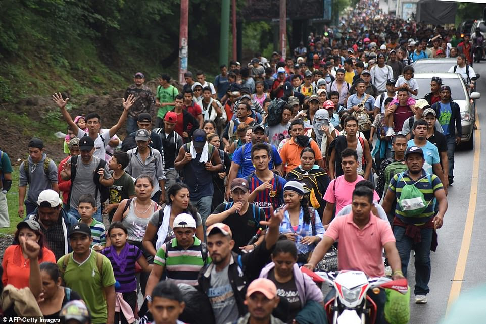Honduran migrants take part in a caravan towards the United Sta