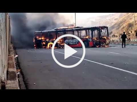 Protesters in Tabriz torch a bus after Iran gas price hike