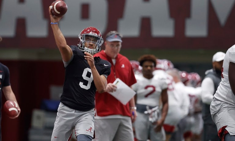 Bryce Young throws the football at Alabama spring practice Friday.
