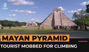 Clueless Tourist Gets Mobbed After Climbing Ancient Mayan Temple (VIDEO)