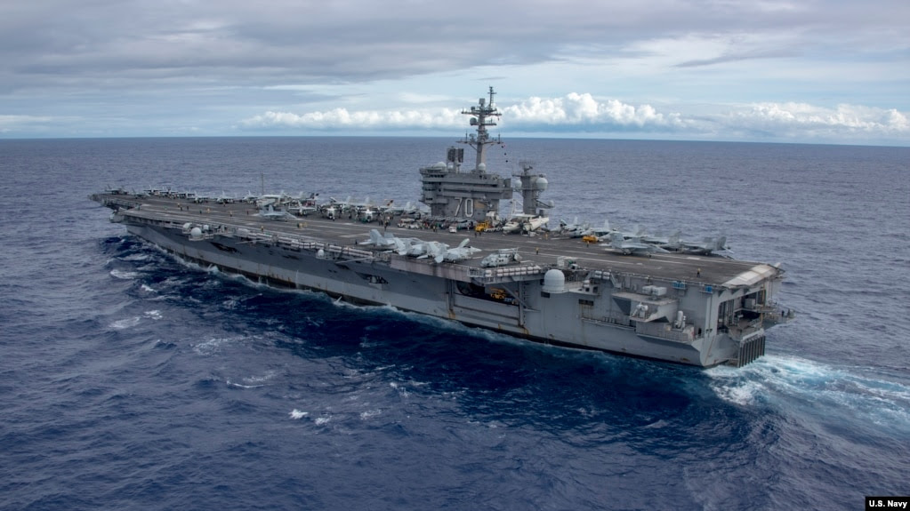 FILE The aircraft carrier USS Carl Vinson crosses the Pacific Ocean on a regularly scheduled Western Pacific deployment, Feb. 3, 2017.