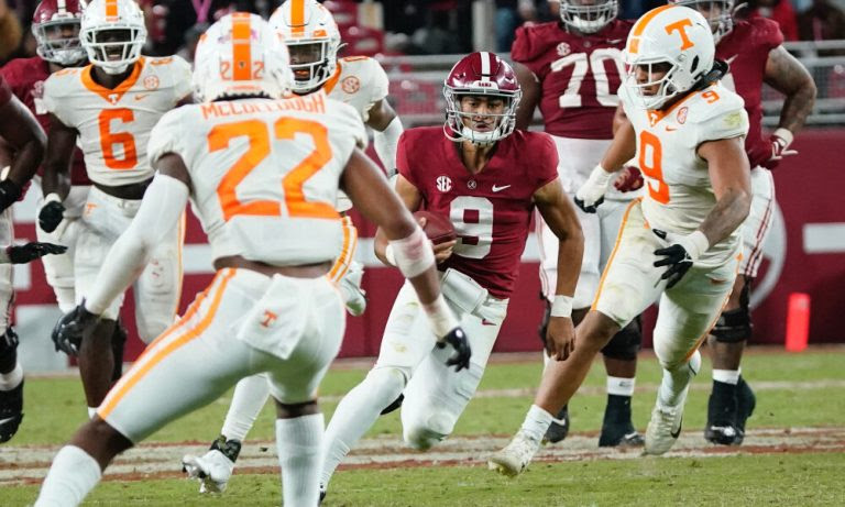 Bryce Young scrambles against Tennessee
