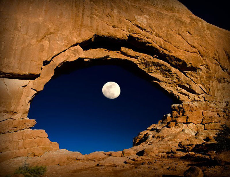 http://twistedsifter.com/2013/02/moon-north-window-arches-national-park/