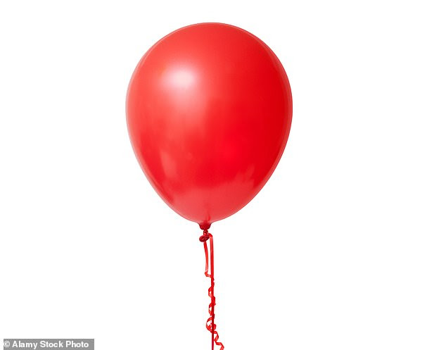 The deflated silicone balloon, no bigger than a grain of rice, is placed on the end of a hollow plastic tube and inserted through the skin into the lower abdomen [File photo]