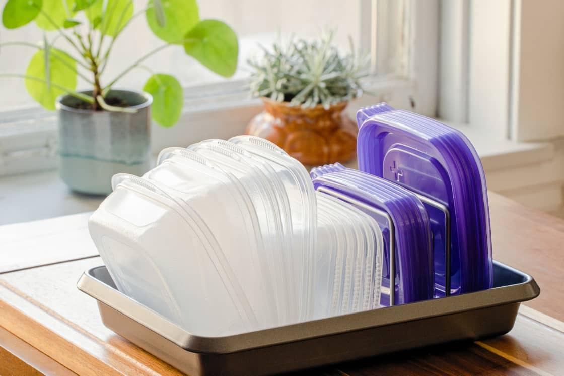 The Smart Dollar-Store Hack for Organizing All of Your Plastic Storage Containers