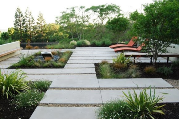 Contemporary garden with lounge chairs