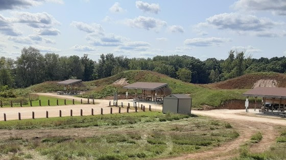 Waushara County Shooting Range stations and grassy mounds in background