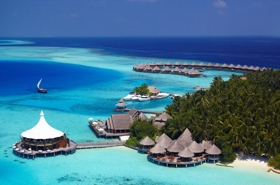 First place: The Maldives, long seen as one of the most romantic places in the world to go on holiday still stuns visitors with its crystal clear waters, white sand beaches and impossibly blue sea and sky. 'High scores across the board' from Conde Nast Traveller readers pushed this destination up from third place into pole position