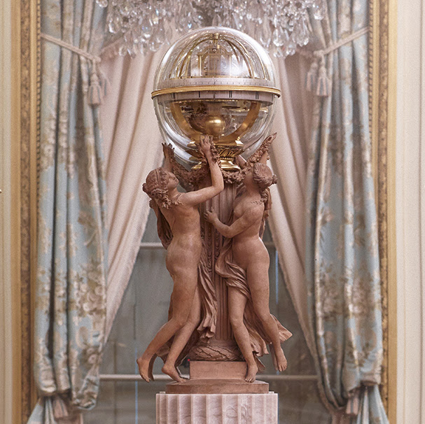 The Dance of Time: Three Nymphs Supporting a Clock