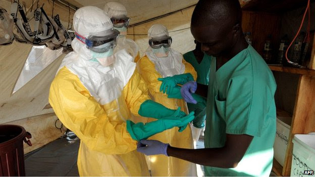 Health workers in isolation ward, southern Guinea (1 April)